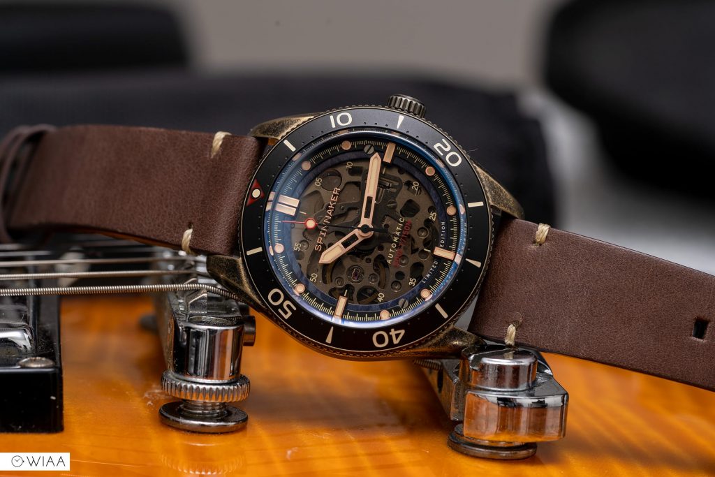 Spinnaker Croft Midsize Limited Edition Watch on a guitar
